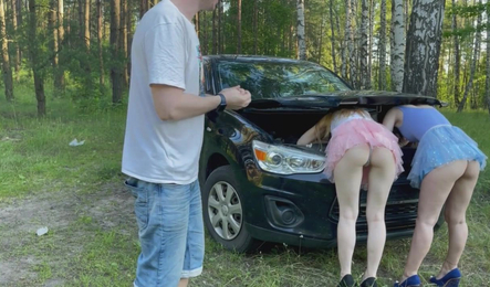 Two bitches stuck of a car and was fucked in the forest